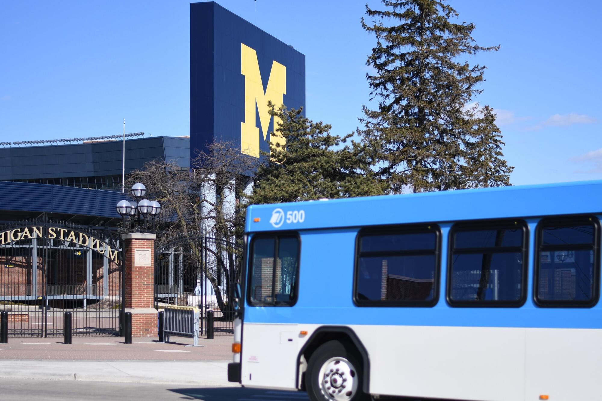 photo of a TheRide bus in front of U of M Stadium