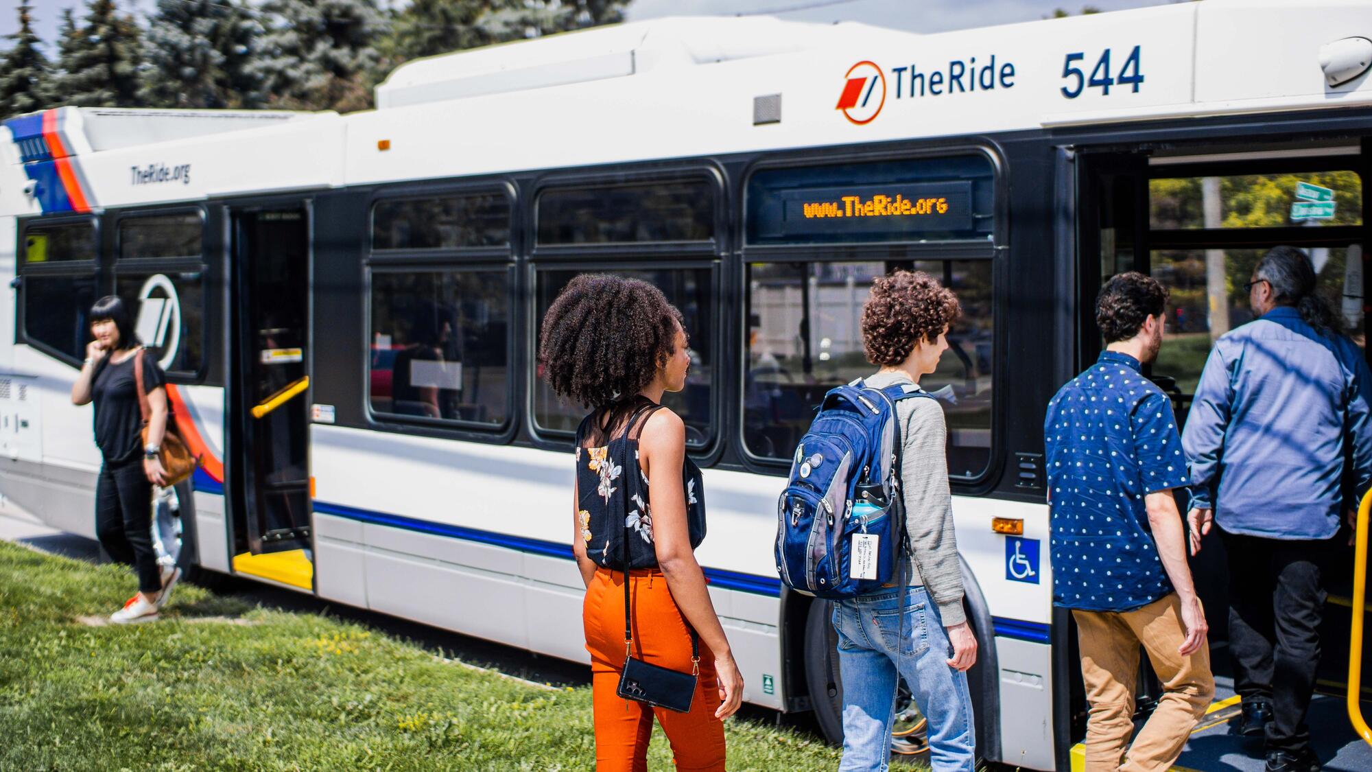 Photo of riders boarding bus